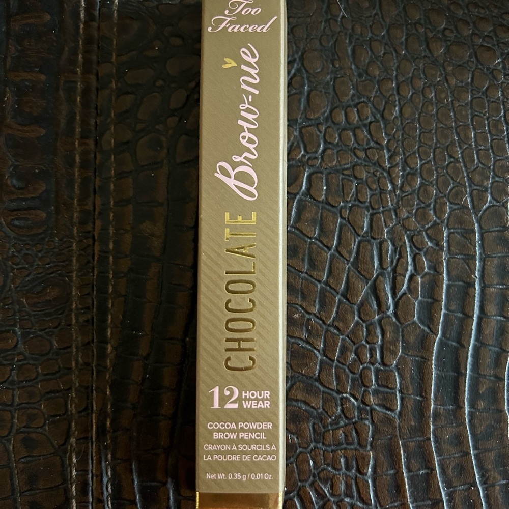 Too Faced Brow-nie 12-Hour Wear Brow Pencil in shade Taupe.